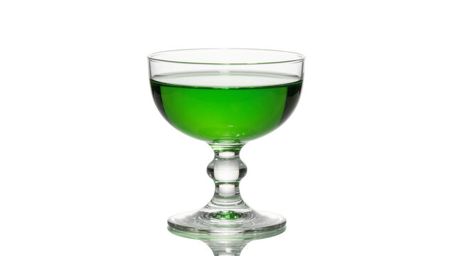 Clear glass coupe cocktail glass filled with vibrant green liquid, isolated on transparent background