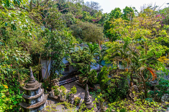 A view down from an upper level of the Marble Mountains in Da Nang, Vietnam on a bright sunny day
