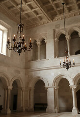 Obraz premium Luxury interior design and architecture, historic stone hall with gothic arches and vintage chandeliers for high end event venue or wedding location