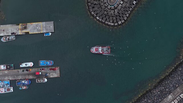 Aerial view of a fishing boat in the harbor, Portugal.