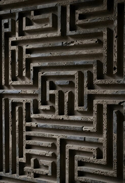 Complexity and problem solving, stone maze pattern with intricate carvings for business strategy and mental challenge concepts in architectural design