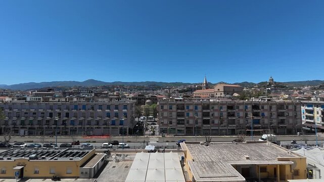 28 April 2026 Italy, Sicily, Messina - timelapse of Cruise Ship view onto residential buildings on Via Vitorrio Emanuele II and Porta moving shadows