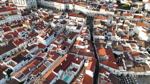 Aerial view of historic Evora rooftops and narrow streets, Portugal.