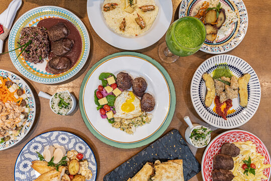 Overhead shot Brazilian food diverse dishes colorful presentation