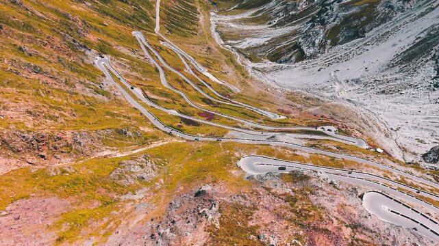 Aerial view of Stelvio Pass winding road in Italy.