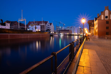 Night view of the Motława River in Gdańsk, Poland – travel background or wallpaper © anettastar