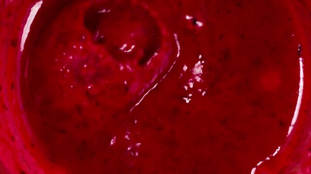 Jem Spray from Blender. Blender creates a berry funnel with sugar, pink bubbles and a spray of mousse flying in the screen
