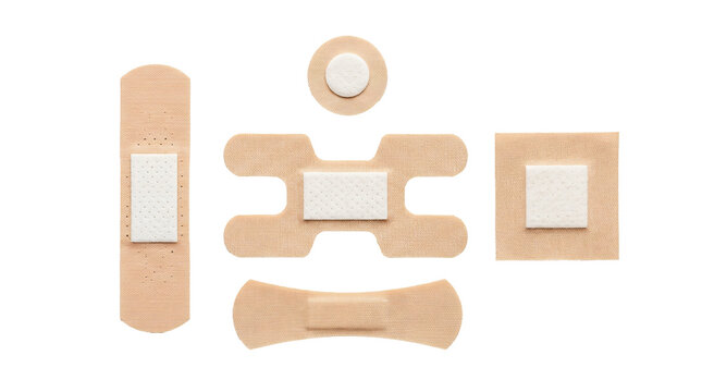 Various medical adhesive bandages for minor skin cuts arranged neatly in different shapes on transparent background