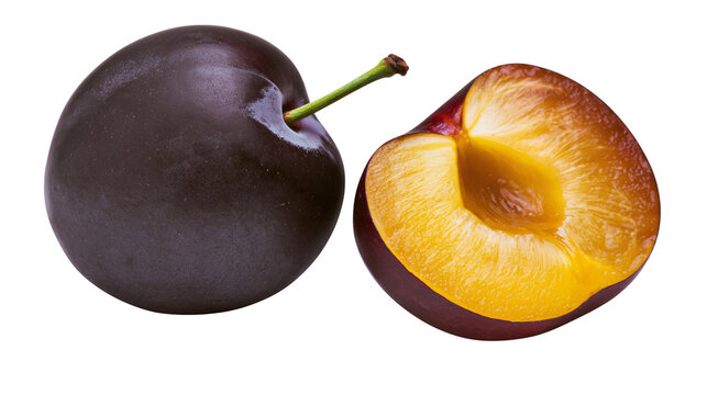 Isolated whole and halved fresh dark purple plums displaying vibrant yellow flesh and green stem