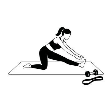 Woman doing a hamstring stretch exercise on a yoga mat with dumbbell and resistance band exercise pose fitness training physical health home workout active lifestyle stretching routine dumbbell