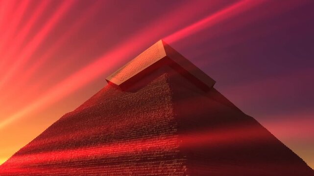 Ancient pyramid with stone capstone under red sunset light against dark sky