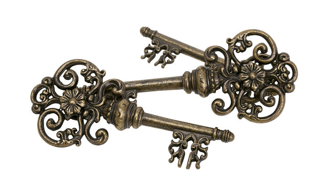 Isolated antique skeleton keys with ornate, decorative handles, old and rustic design