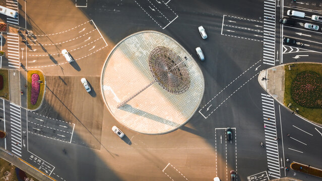 Aerial view of the sculpture at the roundabout on Century Avenue with cars driving on the asphalt roads in Shanghai, Shanghai, China.