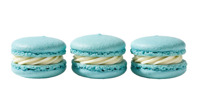 Three pastel blue macarons with creamy white filling, isolated on transparent background