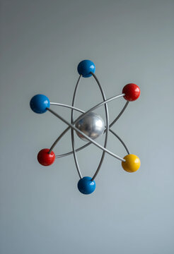 Science and education concept, atomic structure model with colorful spheres electrons and nucleus for physics research and chemistry study