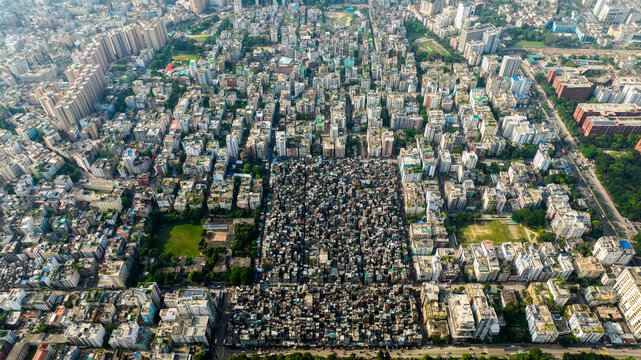 Aerial view of Geneva Camp surrounded by dense residential buildings and urban infrastructure in Dhaka, Dhaka Division, Bangladesh.