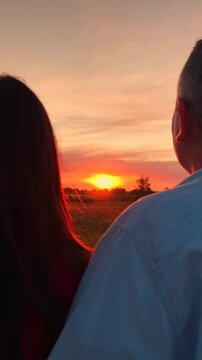 man woman hugging watching sunset, people love hugging sunset, happy family, Romantic Sunset Couple, Lovers Watching the Horizon, Together at Sunset, Embrace, Evening with Beloved, Peaceful Field