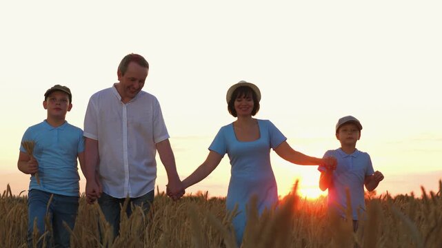 happy family, parents man woman holding children hands sunset park, mother father parents kid outdoors nature, agronomist grow growing, unity at sunset, wheat harvest farmer, travel son business
