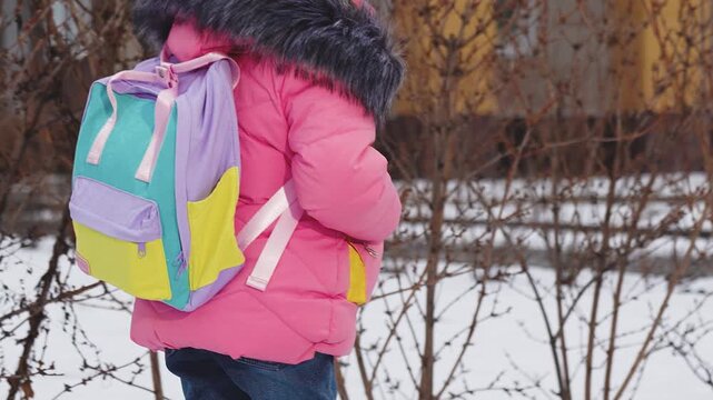 School, child kid girl daughter goes school with backpack white snow winter, girl hurry study class, little schoolgirl with bag walking through park school building, happy chilt school backpack hurry