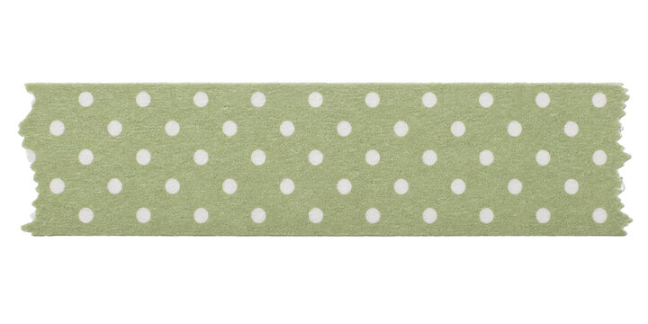 Strip of green washi tape with white polka dot pattern isolated on a clean white background