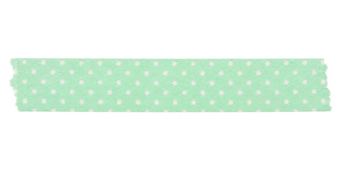 A strip of light green washi tape with a white polka dot pattern on a plain white background © Sapphire