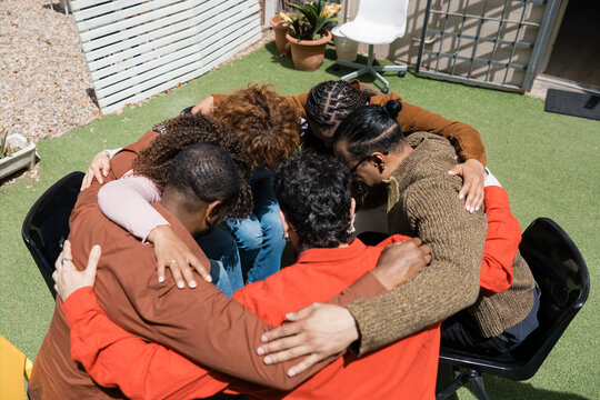 Diverse people participating in group therapy support circle