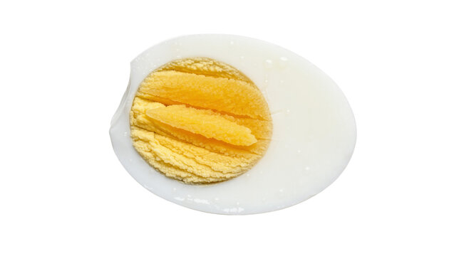 Half hard-boiled egg with textured yellow yolk and white albumen, isolated on transparent background