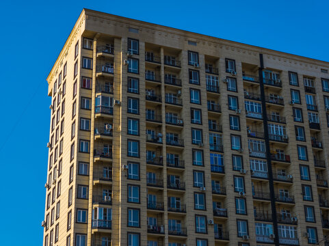 Modern Apartment Building with Balconies and Windows