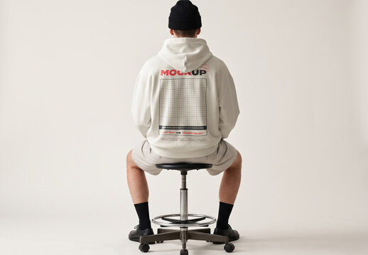 Man from Back SItting Hoodie Mockup
