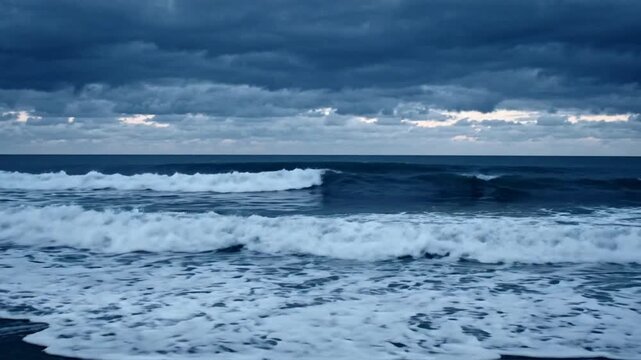 Dramatic ocean waves crashing under moody stormy clouds at twilight cinematic coastal seascape