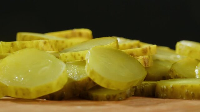 Sliced Pickles Floating in Mid-Air