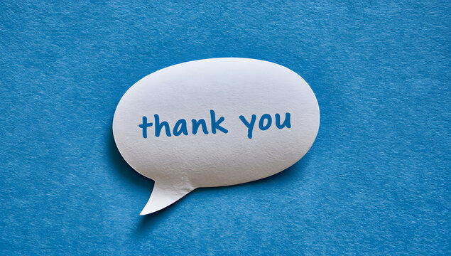 A creative speech bubble cutout on a blue textured surface, featuring a heartfelt handwritten note expressing customer appreciation and positivity