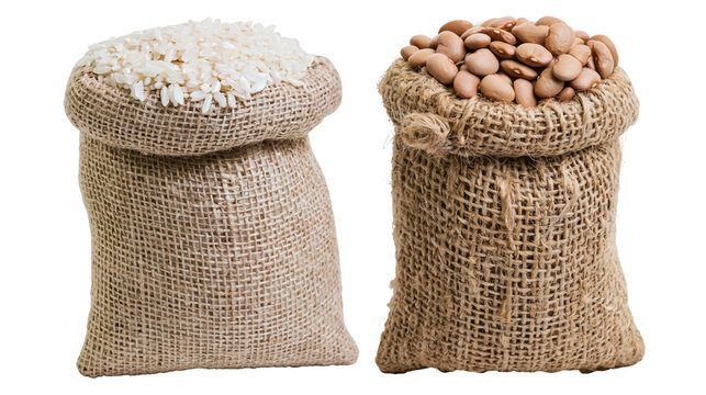 Isolated burlap bags filled with uncooked rice grains and dry beans, traditional food staples