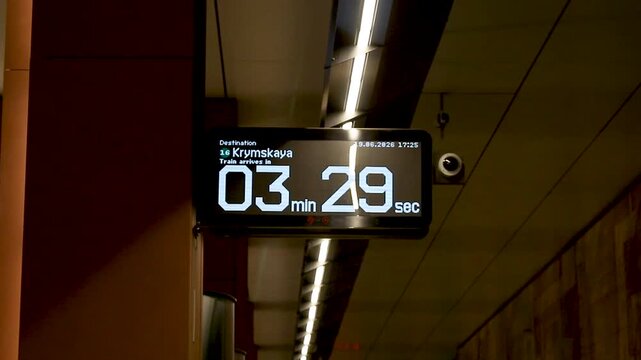 Digital Countdown Timer Displaying Train Arrival Time in Metro Station