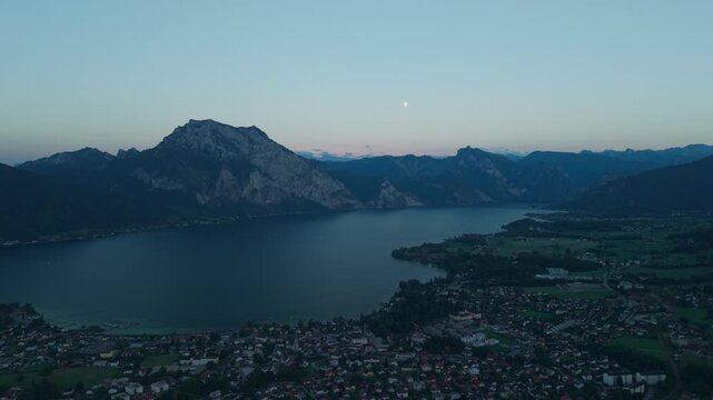 Aerial view of Traunstein mountain and Traunsee lake at blue hour in Austria