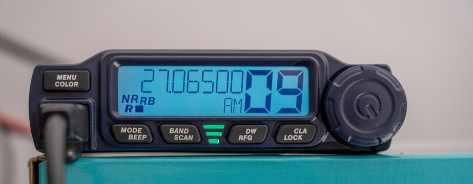 CB radio tuned to channel 9 in AM, emergency.