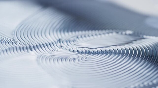 Water ripples on abstract blue surface with layered concentric wave patterns