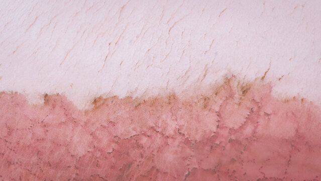 Aerial view of the abstract pink and white salt patterns of Hutt Lagoon in Yallabatharra, Western Australia, Australia.