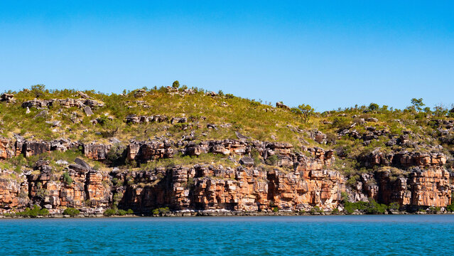 Kimberley coast australia orange cliffs ancient iron sandstone monuments tectonic old impressive black unique geology