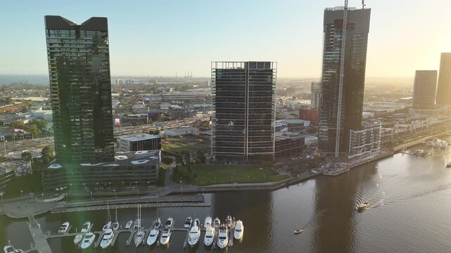 Melbourne CBD, Victoria, Australia &ndash; 4K aerial drone view of modern city skyline, Yarra River, Docklands marina, luxury yachts, skyscrapers and waterfront architecture