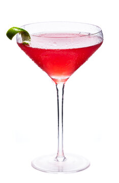 Cosmopolitan Cocktail served in a chilled coupe glass isolated on a white background.