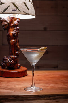 Elegant cocktail in a martini glass. The classic Vesper Martini, stylized background adds moody sophistication. Ideal for upscale bar or cocktail menus