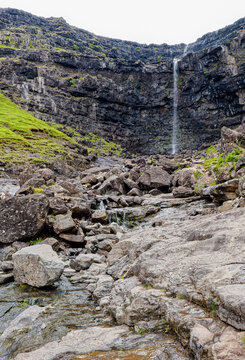 Waterfall Over Basalt Cliffs