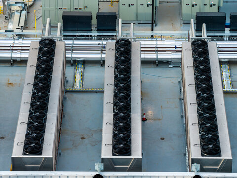 Aerial view of industrial cooling units and HVAC equipment on a data center rooftop in Sydney, New South Wales, Australia.