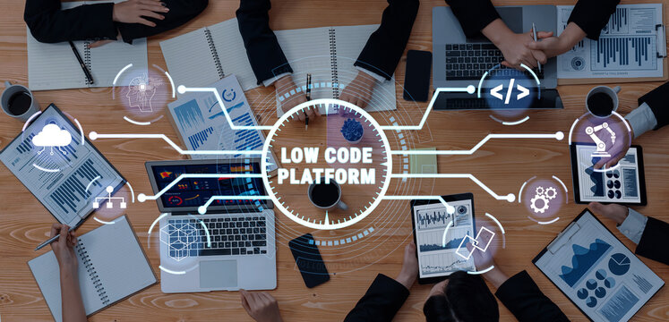 Collaborative Meeting on Low Code Platform Development with Digital Tools and Technology in Modern Office Environment Quark.