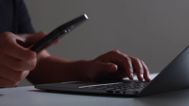 Secure 2FA authentication concept with verification, password protection and cybersecurity technology. Person using laptop and smartphone to login access for online account, privacy and data security.