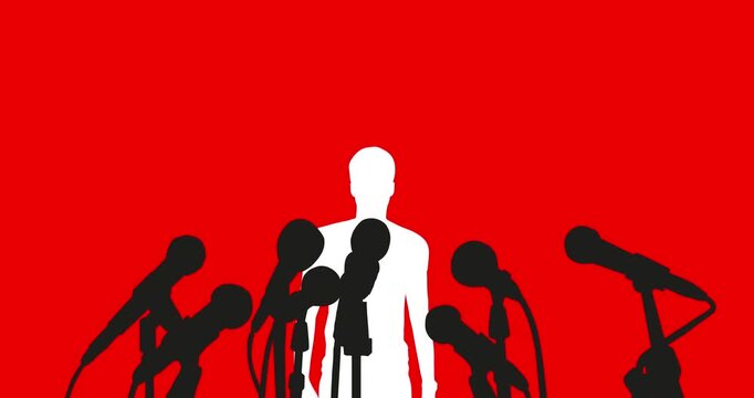Man At Press Conference Speaking To Media With Multiple Microphones And Reporters Silhouette