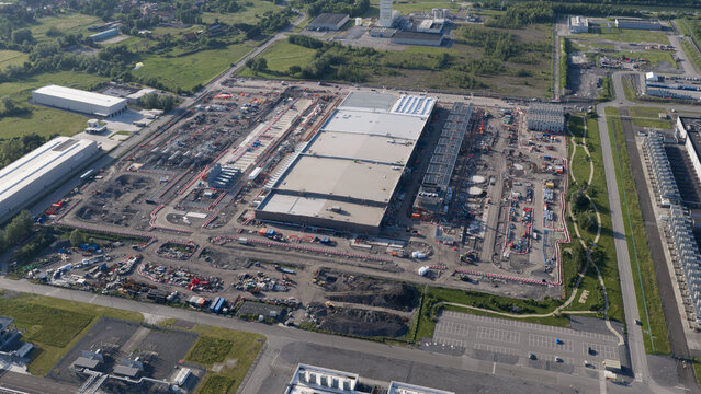 Aerial view of the Google data center facility featuring large industrial buildings and construction areas in Saint-Ghislain, Region wallonne, Belgium.