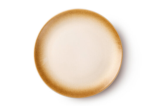 Top view of round ceramic dinner plate with a minimalist beige center and rustic brown speckled edges. Elegant stoneware for professional food styling and presentation, isolated on white background.