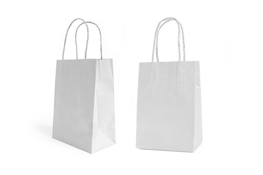 White Paper Shopping Bags with Handles Mockup isolated on white background.